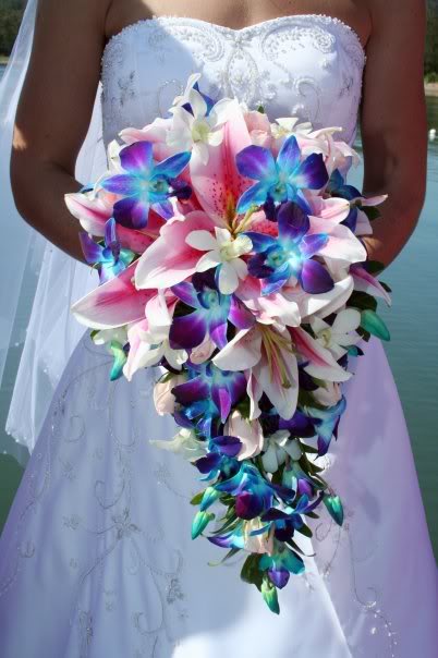 Beautiful cascading bridal bouquet made of Pink Oriental Lillies White 