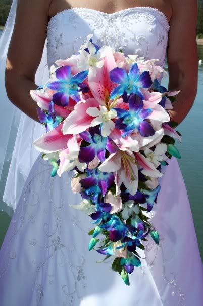 Beautiful cascading bridal bouquet made of Pink Oriental Lillies