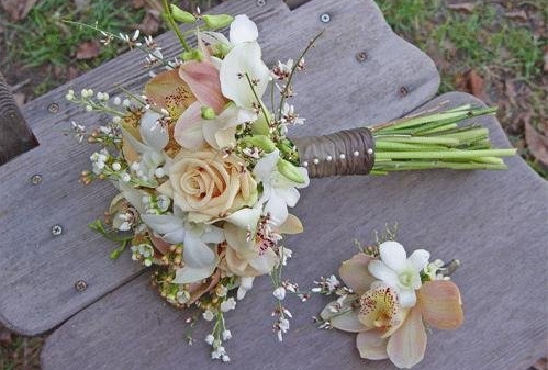 Light pink and white wedding bouquet with red crystals