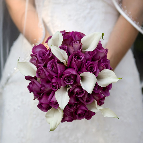 Fuchsia roses and white calla lilies wedding bouquet