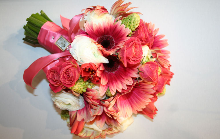 Stunning dusty pink bouquet with gerbera and roses and a hint of white with