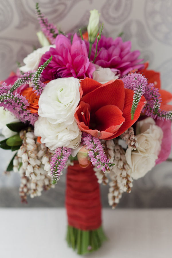 In love with this amazing pink orange and white bridal bouquet