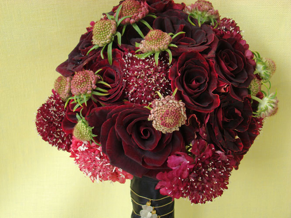 An amazing red bridal bouquet created by Fresh Cut Design