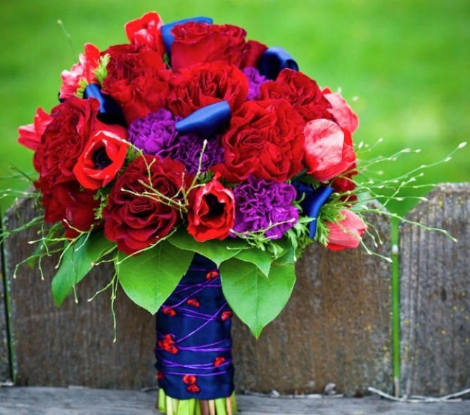 Beautiful red flowers bridal bouquet with red peonies red anemones 