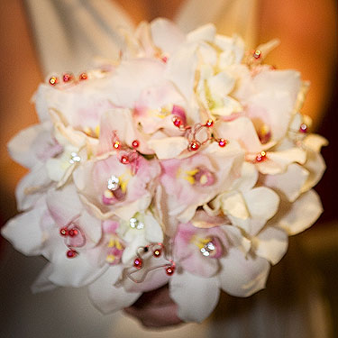 Light pink and white wedding bouquet with red crystals