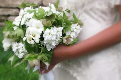 Lovely bride's bouquet of freesia green lenten rose and white hydrangeas