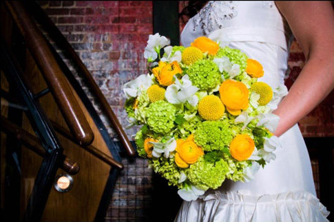 green and yellow bridal bouquet It appears to be composed of bright yellow