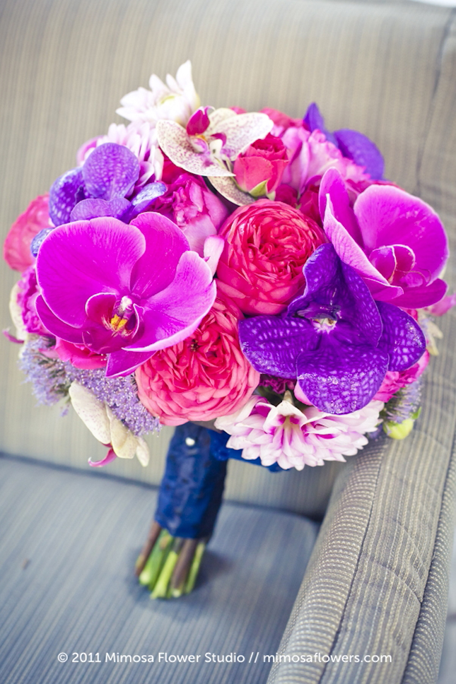 Beautiful pink and purple bridal bouquet created by Mimosa Flowers