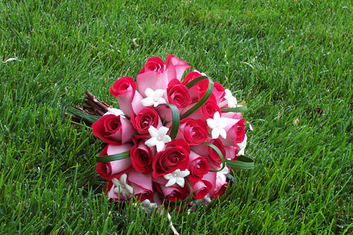 red roses with white Stephanotis created by The Flower House Weddings
