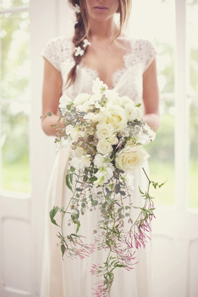 Stunning vintage style cascading wedding bouquet with white roses 