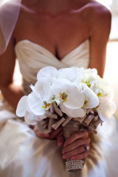 Elegant white bridal bouquet made up of white orchids