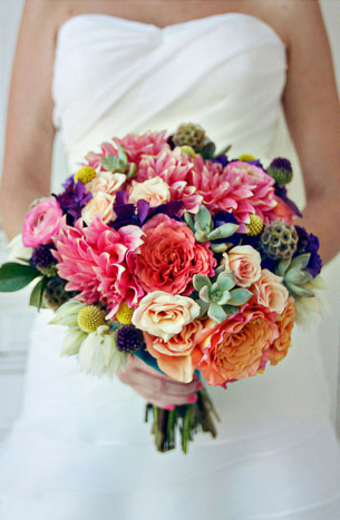 Beautiful rustic and colorful bouquet from a real wedding with a Love is in