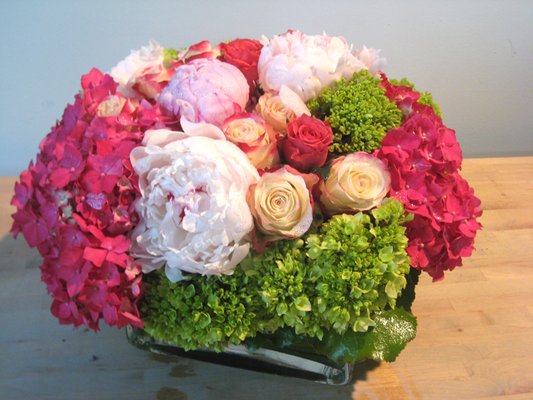 pinkgreenhydrangearosespeoniescenterpiece Coral pink peony bouquet with 