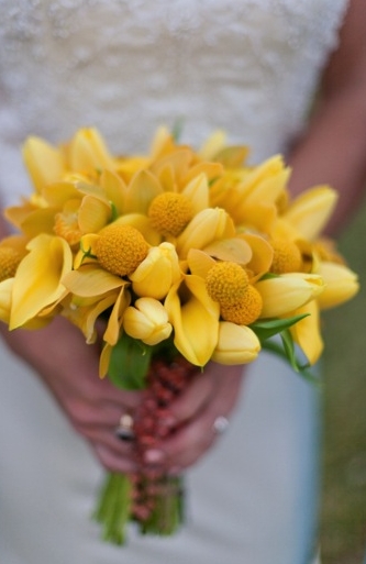 Stunning yellow bridal bouquet with tulips and craspedias from a modern 