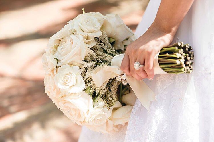Traditional white roses wedding bouquet