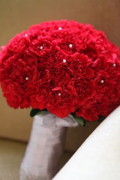 red carnations bridal bouquet