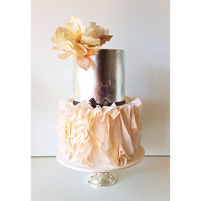 silver cake with ruffles