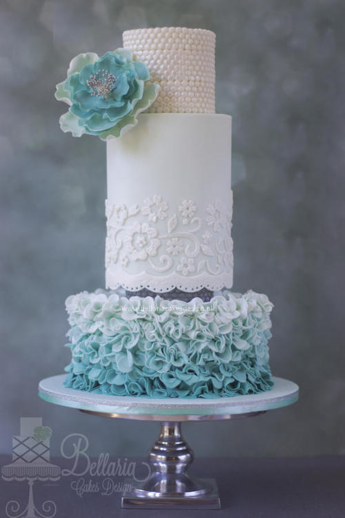 Ombre ruffle and pearl wedding cake