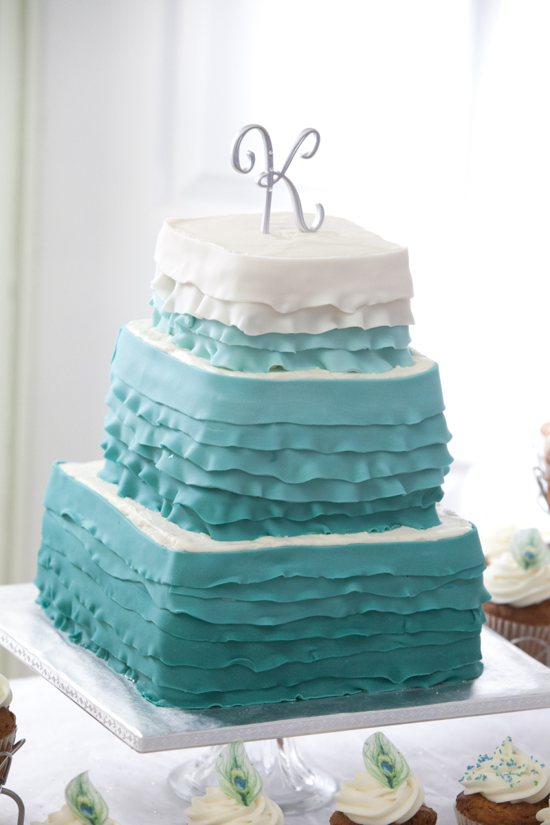 Ruffled teal wedding cake