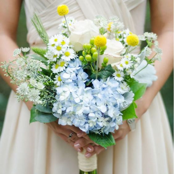 blue hydrangeas, white roses and billy balls