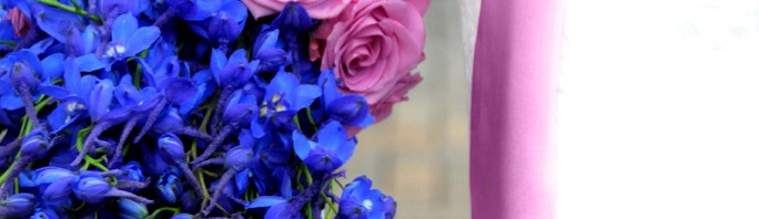 Blue Delphiniums and Purple Roses
