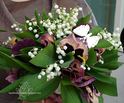 lily of the valley and pansy bouquet