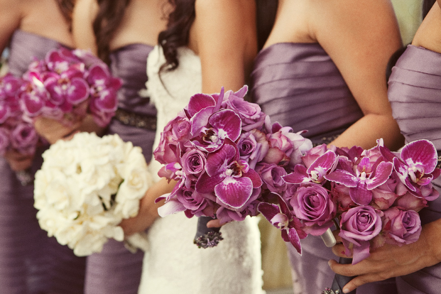 purple-roses-orchids-bridesmaids-bouquets