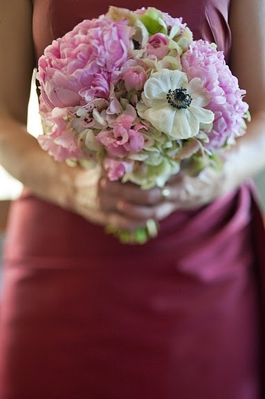 Springtime bridesmaids bouquet with anemones and peonies