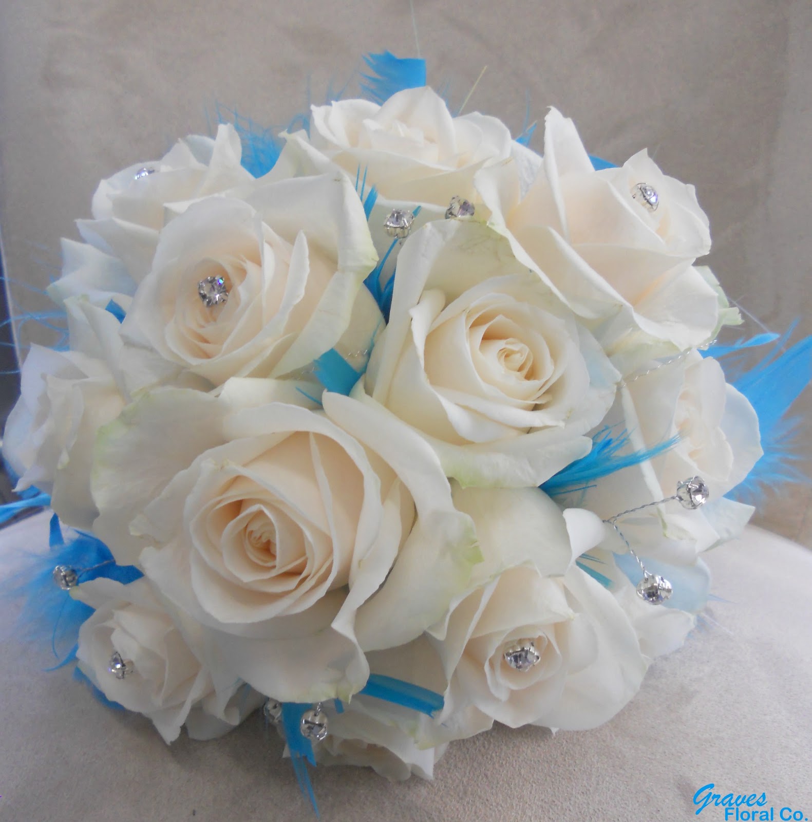 White Roses Diamantes and Blue Feathers Bouquet