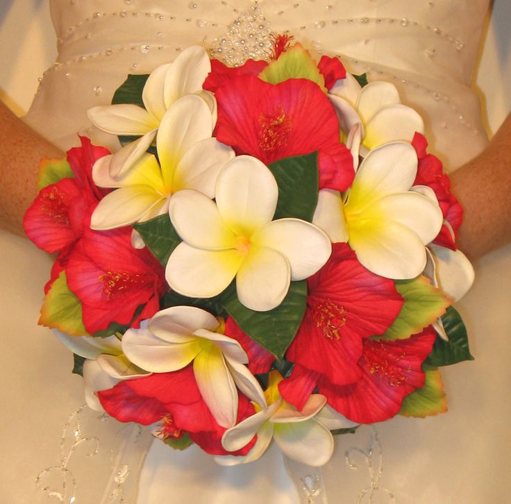 Red hibiscus bouquets and frangiapani